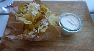 Chips with parmesan and a horseradish dip.